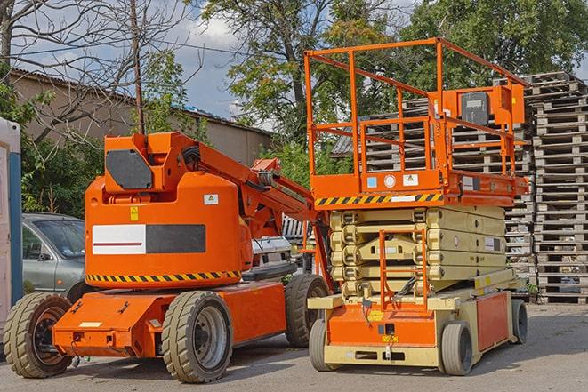 forklift transporting boxes in a busy warehouse in Marlborough